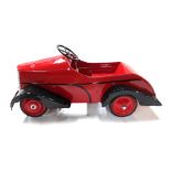 A 20th century French child's pedal car, red, 100cm long.