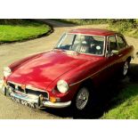 A 1974 MGBGT 1800cc, damask red with black interior trim, engine number 4589,