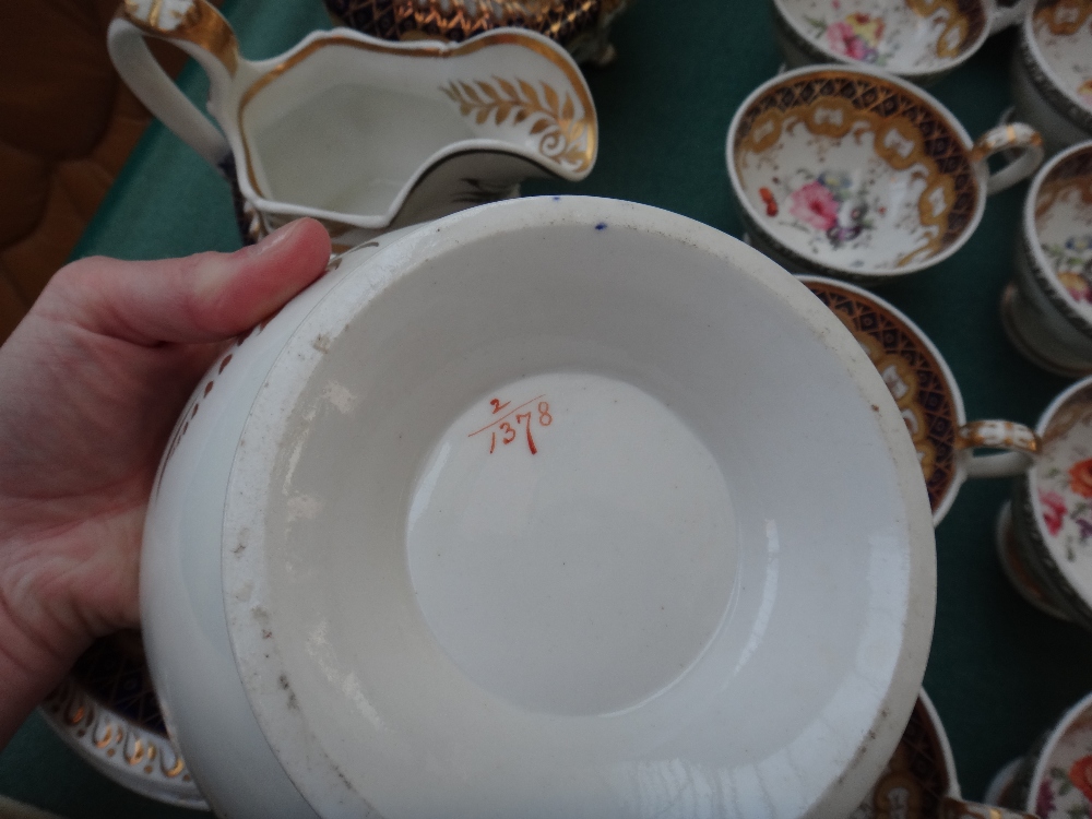 A Ridgway porcelain part tea service, circa 1825-30, painted with flower sprays inside deep cream, - Image 8 of 8