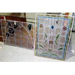 Two similar stained leaded glass windows, each 23 x 31cm.