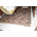 An Ersari carpet, the madder field with three columns of four large guls, supporting crosses,