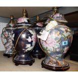 A group of five 20th century ceramic table lamps with floral decoration.