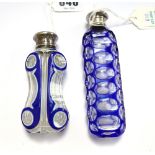 A Victorian blue flashed cut glass scent bottle with white metal screw cap, 11.