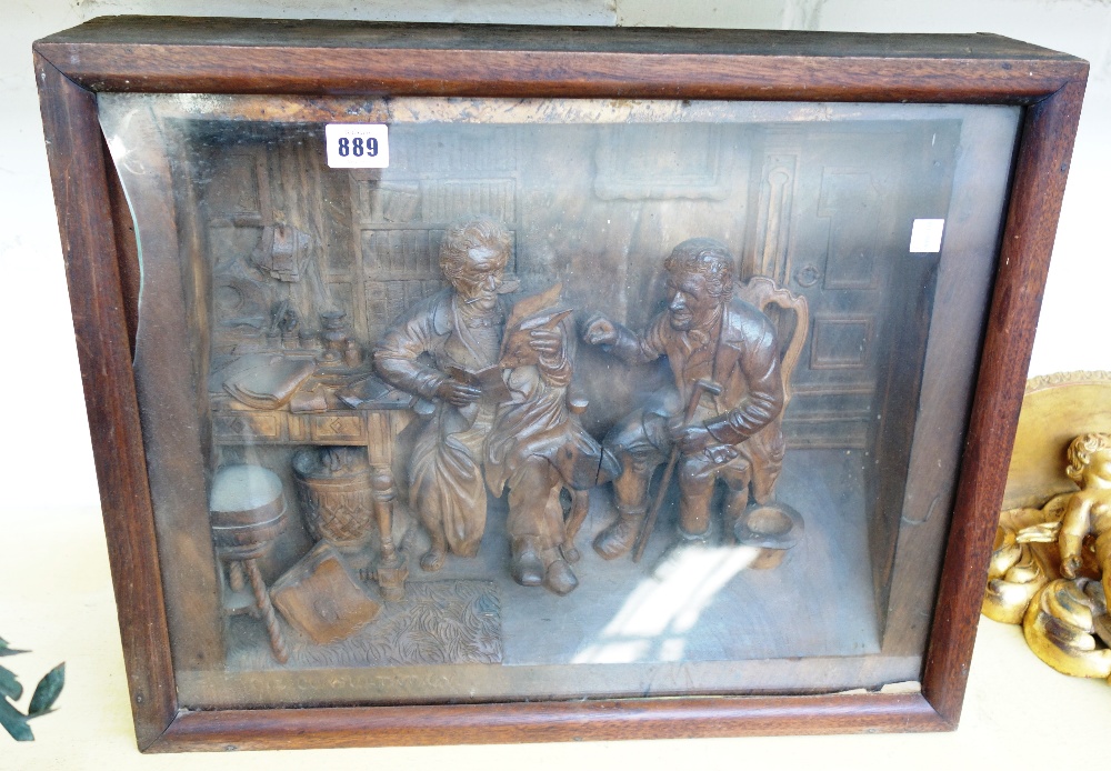 A Continental carved walnut group entitled 'The Consultation', C.