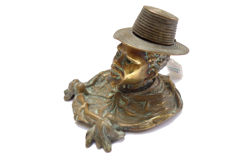 A Victorian brass novelty inkwell modelled and cast as the head of a Nubian male, - Image 2 of 2