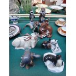 A collection of Heubach porcelain animals, comprising; a stag, 24cm wide, a pheasant,