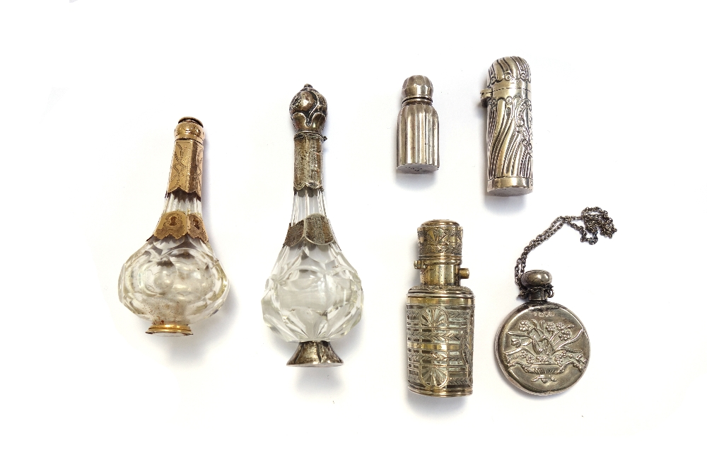 An embossed silver scent bottle, hallmarked Birmingham 1897, 6cm,