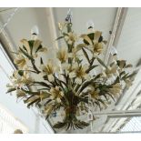 A polychrome painted metal six light electrolier, 20th century, of intertwined floral form,