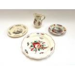 A group of English creamware, circa 1775, comprising; a small plate with feather moulded rim,