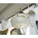 An Edwardian brass and cut glass dish light with cut glass bowl surrounded by three shaped shades,
