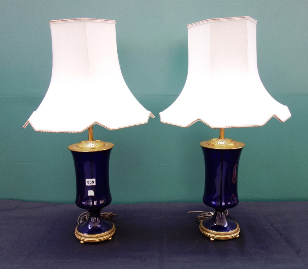 A pair of Bristol blue glass table lamps, 20th century, with gilt brass mounts,