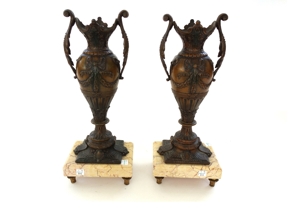 A pair of cornucopia shaped yellow glass vases, with bronze glove finials on alabaster plinths, 12. - Image 3 of 4