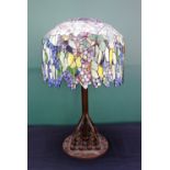 A bronze and coloured glass Tiffany style table lamp, late 20th century,