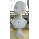 A white marble female bust, early 20th century, depicting a young girl atop a socle, unsigned,