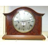 A mahogany cased mantel clock, circa 1900, the domed top over a silvered 7.