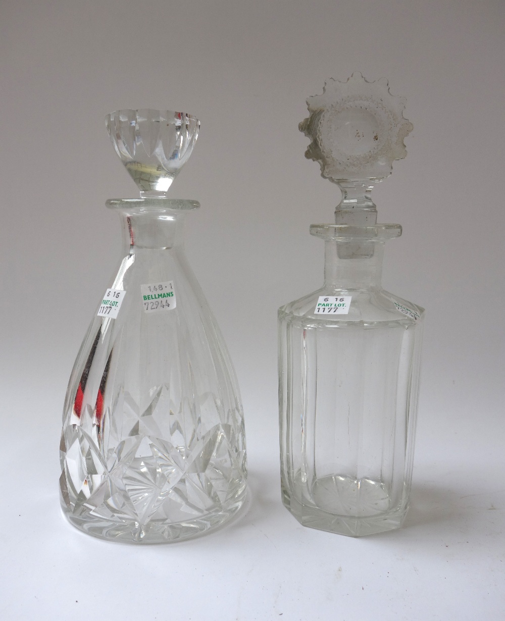 Twelve 19th century cut glass decanters and stoppers (some stoppers matched), the largest 30cm high.