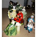 A group of nine Royal Doulton ceramic figures and a Beswick model of a horse.