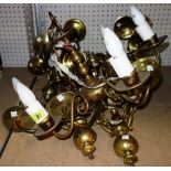 A quantity of 20th century Dutch style brass wall lights and a small chandelier.