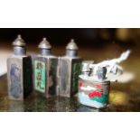 A miniature Chinese metal triptych scent bottle decorated with characters and a miniature lighter