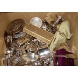 A quantity of silver plate including toast racks, tea pots, hot water jugs, plates, trays,