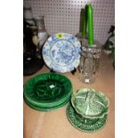 An English delft blue and white plate, a pair of glass lustres and a group of green leaf ceramics.