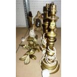 A group of metalware collectables including four brass table lamps,