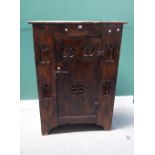 A 16th century style stained elm aumbry,