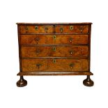 A William and Mary walnut chest,