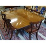 A George IV mahogany rectangular snap top dining table,