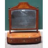 A Regency marquetry inlaid tulipwood banded toilet mirror, with bow three drawer base, 58cm wide.
