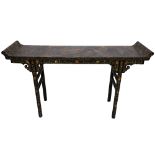 A late 19th century Chinese black lacquer chinoiserie decorated altar table,