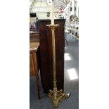A gilt brass Empire style standard lamp, 20th century,