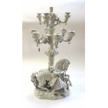 A large German Thuringian porcelain ten light figural candelabrum, late 19th century,