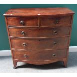A Regency mahogany bow front chest of two short and three long graduated drawers,