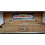 A Jaques croquet set, late 20th century, comprising four mallets, balls,