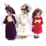 Three bisque head dolls, circa 1900 and later, comprising; Armand Marseille no.1894, a French S.F.B.