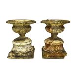 A pair of 19th century marble campana shaped garden urns, with semi fluted bodies,