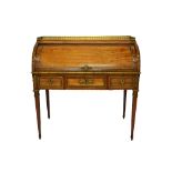 A Louis XVI style ormolu mounted rosewood cylinder bureau, with pull-out fitted interior,