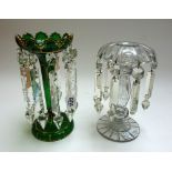 A Victorian green glass and gilt decorated table lustre, with castellated rim and circular foot, 24.