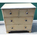 A 19th century later grey painted chest of two short and two long drawers, on bracket feet,