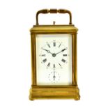 A brass cased carriage clock, late 19th/early 20th century, hour push repeat,