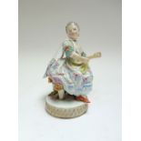 A Meissen porcelain figure, late 19th century, modelled as a lady in a floral dress,