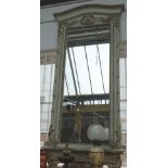 A large parcel gilt grey painted wall mirror, with opposing 'C' scroll frieze,