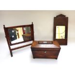 A Regency rosewood sarcophagus tea caddy, 28cm wide, an inlaid mahogany wall mirror,