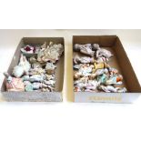 A quantity of early 20th century porcelain pin cushion dollies, mainly Continental,