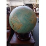 A Philips nineteen inch terrestrial globe, late 20th century, on a circular mahogany base,
