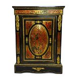 A 19th century gilt metal mounted ebonised boulle side cabinet with single door, on plinth base,