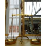A set of Victorian brass pan scales by Hall & Sons, Birmingham, 72.5cm high.