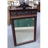 A Victorian mahogany and embossed copper mounted wall mirror, with bevelled mirror plate,