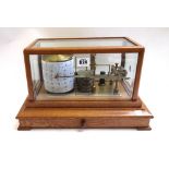 A Negretti & Zambra oak cased barograph, late 20th century,